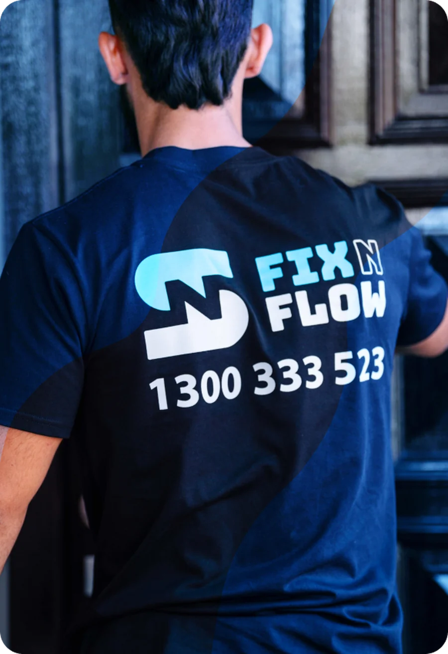A Fix N Flow plumber at a customer's front door
